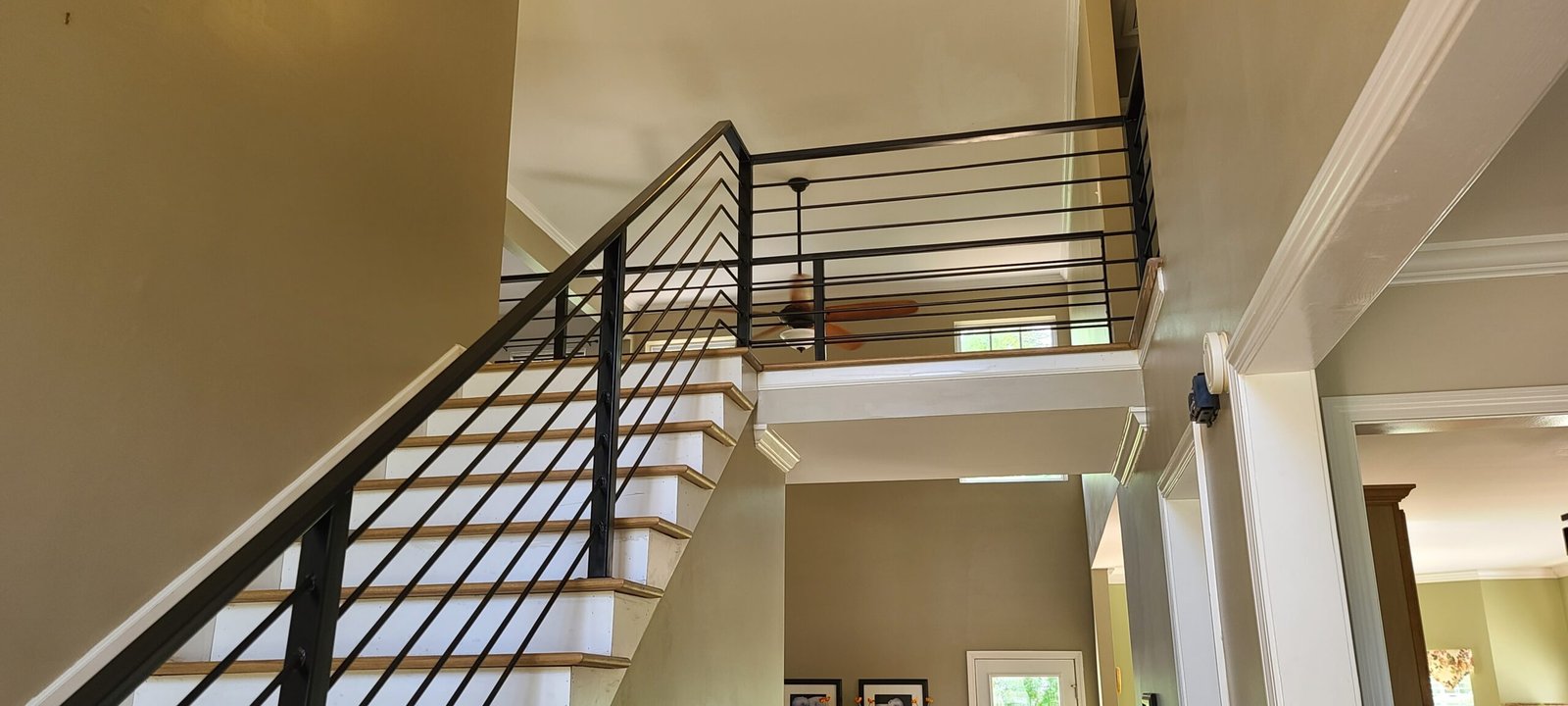 Modern steel staircase railing in a Middle Tennessee home interior