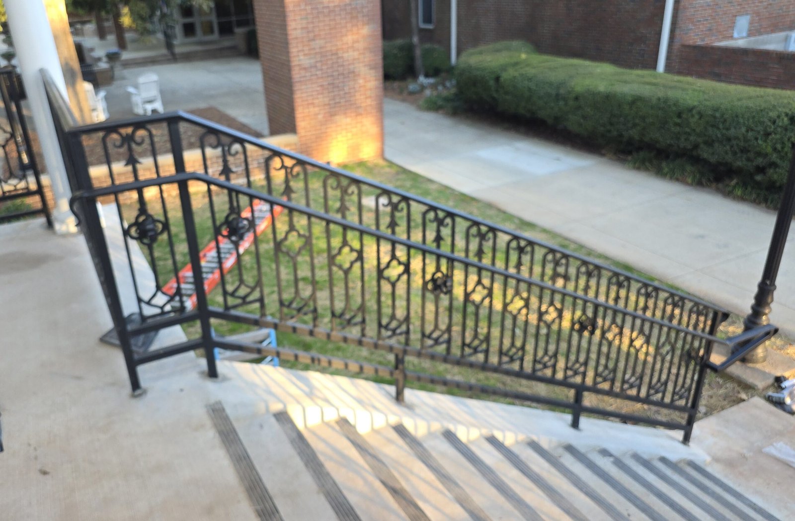 Ornamental scrollwork ADA compliant ramp railing fabricated by 3D Custom Welding