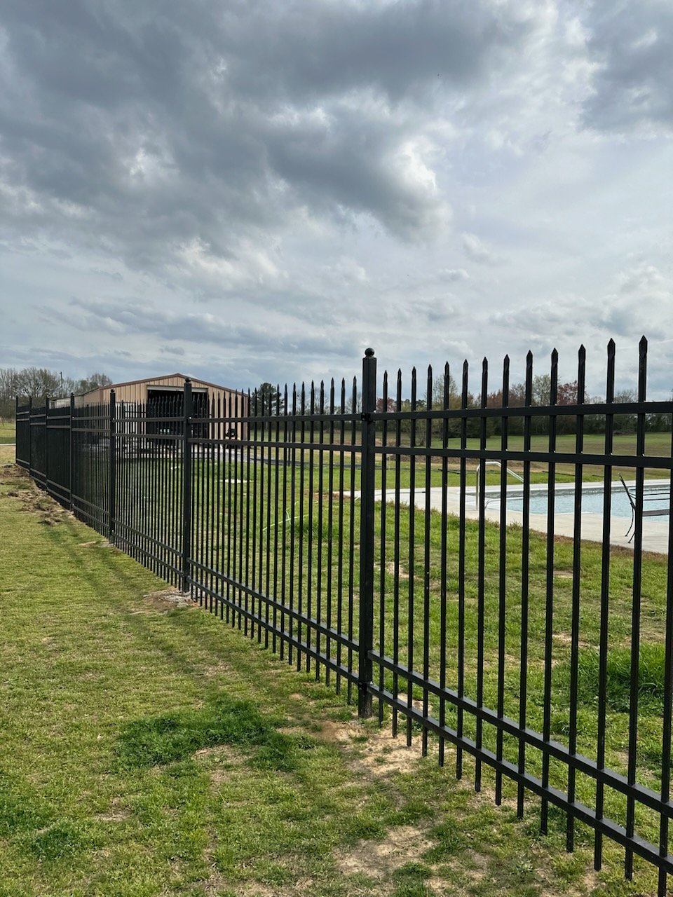 Black wrought iron pool fence at a Middle Tennessee residence